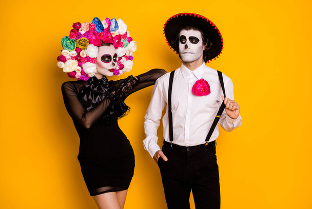 Portrait of his he her she glamorous elegant chic gorgeous couple wearing calavera clothes look outfit posing enjoying event isolated bright vivid shine vibrant yellow color background - Valokuva, kuva