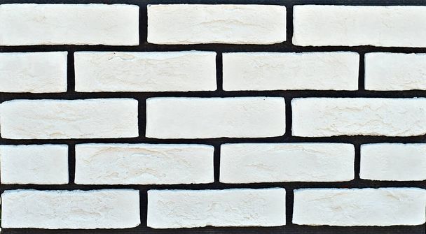 Texture of brick wall. new brickwork. Samples of wall or fence are presented at exhibitions. Gray brick close up. - Valokuva, kuva
