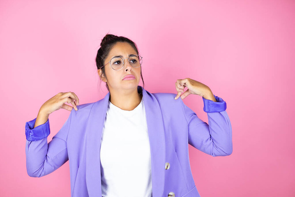 Young beautiful business woman over isolated pink background with a successful expression - Photo, Image