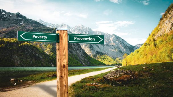 Street Sign the Direction Way to Prevention versus Poverty - Photo, Image