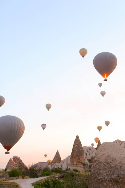 Lot of hot air balloons flying in Cappadocia, Turkey. - Valokuva, kuva