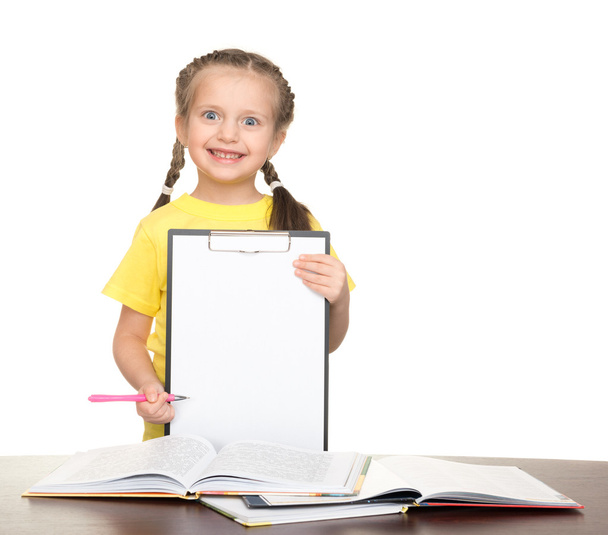 girl with clipboard and books - Foto, afbeelding