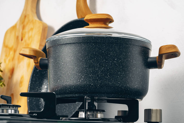 Clean saucepan on a gas stove in kitchen - Φωτογραφία, εικόνα