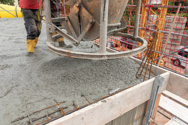 detail of filling base plate with fresh concrete - Photo, Image