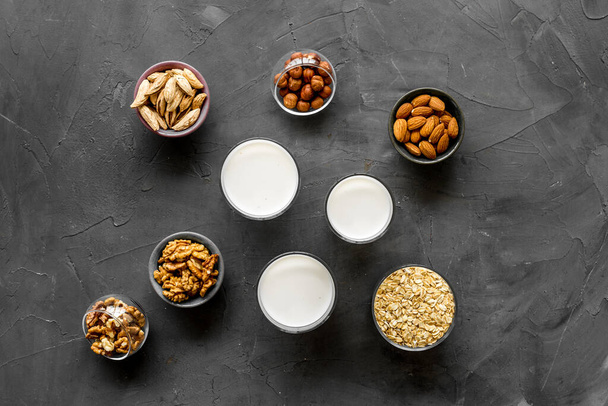 Glasses of non-dairy vegan milk - lactose free nuts and grain drink. Top view - Fotografie, Obrázek