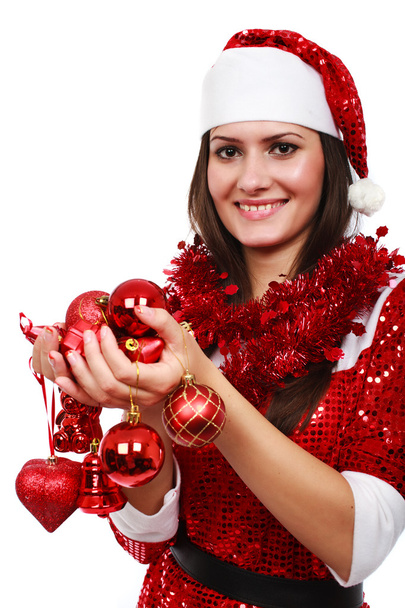 Santa girl with Christmas balls - Фото, изображение