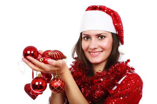 Santa girl with Christmas balls - Foto, afbeelding