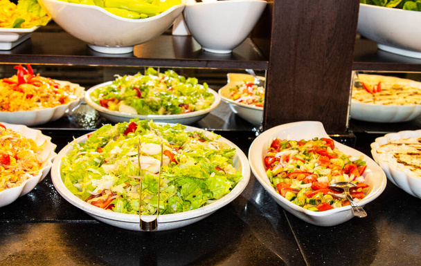 Catering food, salad in a white plate, buffet - Photo, image