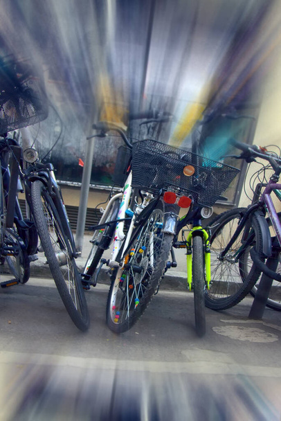 Bikes at entrance to supermarket, bike replaced car, healthy lifestyle and movement - Photo, Image