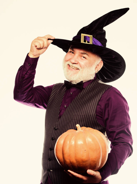 Cosplay outfit. Wizard costume hat Halloween party. Senior man white beard celebrate Halloween. Magician witcher old man. Magic concept. Experienced and wise. Magic spell. Halloween tradition - 写真・画像