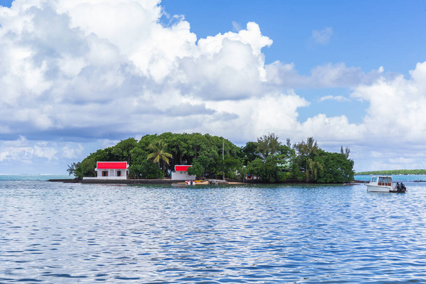 A small island off the coast at Pointe des Regates in Mahebourg, Grand Port, Mauritius - Photo, Image