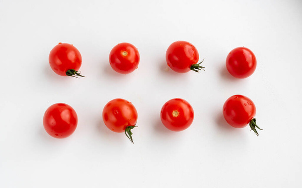 Cherry tomatoes isolated on a white background. The view from the top. the concept of harvest. - Photo, image