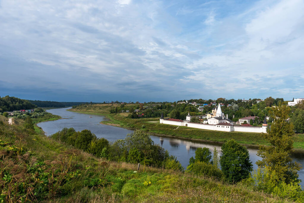 Scenic summer view of Staritskiy Holy Dormition Monastery on the Volga River in Staritsa, Russia. - Fotó, kép