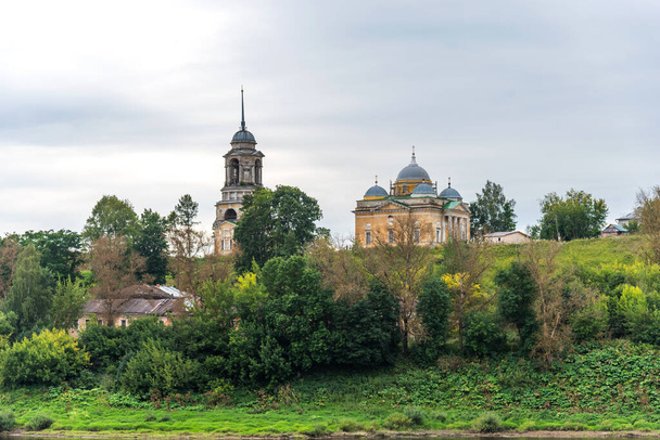 Scenic summer view of abandoned Boris and Gleb Cathedral on the Volga River in Staritsa, Russia. - Photo, Image