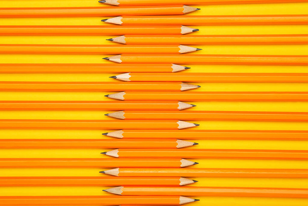 Yellow pencils on yellow background - Фото, зображення