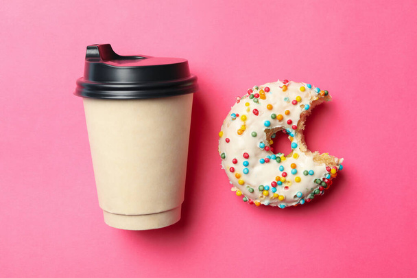 Paper cup and donut on pink background - Photo, Image