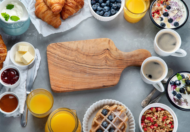 Healthy breakfast with freshly baked croissants on gray background.  Top view, flat lay, copy space. - Zdjęcie, obraz