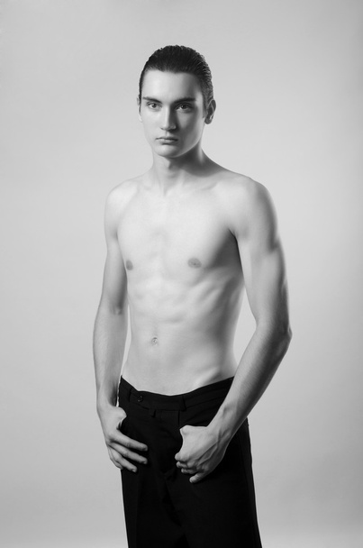Very skinny young man, slim beautiful boy, anorexic body - Фото, зображення