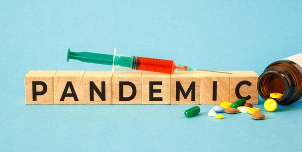 PANDEMIC word written on wood blocks. Medical concept - Φωτογραφία, εικόνα