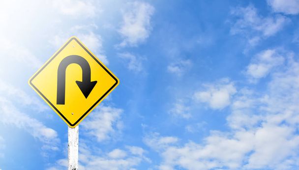 Directional arrow, traffic signs isolated on cloudy bluesky background. - Photo, Image