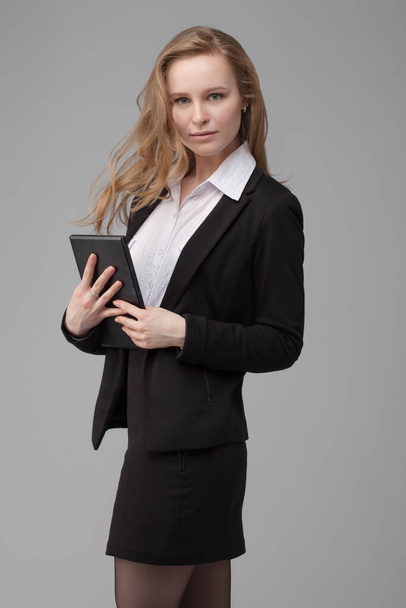  business portrait of sexy woman. on gray background - Fotó, kép