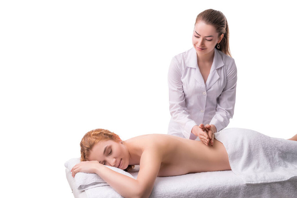 Smiling woman doing massage on back of client - Foto, Imagem