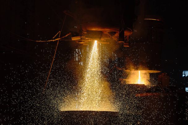 Metallurgy. Casting ingot. Electric arc furnace shop. - Photo, Image