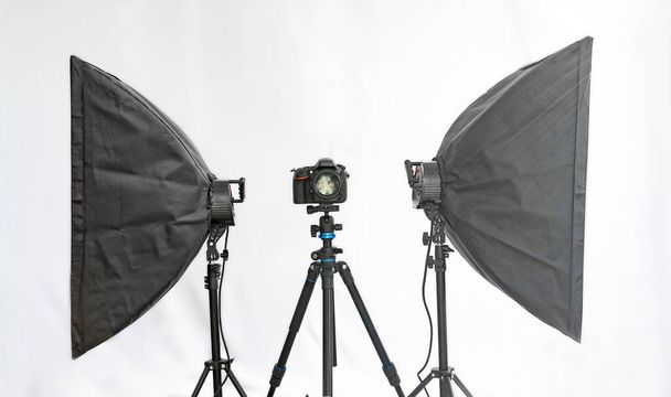 Dslr camera on tripod wirt two soft box. Studio set for shooting - Photo, Image