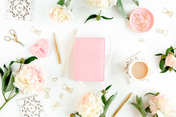 Workspace with diary, notebook, accessories, peony flowers on white background. Home office desk. Top view feminine background. Flat lay, top view. - Photo, Image