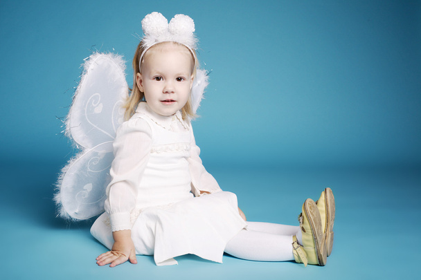 Cute little girl with butterfly costume - 写真・画像