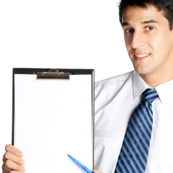 Happy smiling young business man showing blank clipboard - Fotoğraf, Görsel