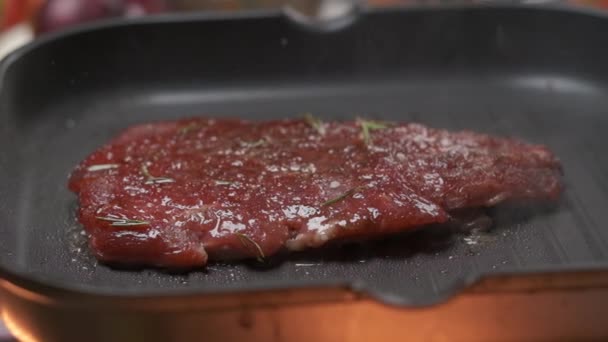 Close up professional chef grilling meat fillet steak. Slow motion - Imágenes, Vídeo