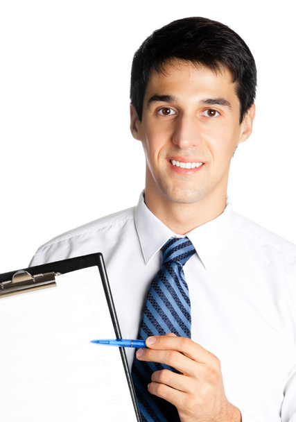 Happy smiling young business man showing blank clipboard - Foto, afbeelding