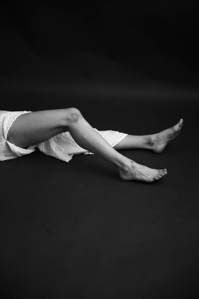 Details of body of beautiful girl, fashion and art, authentic black and white photo shoot - Photo, image