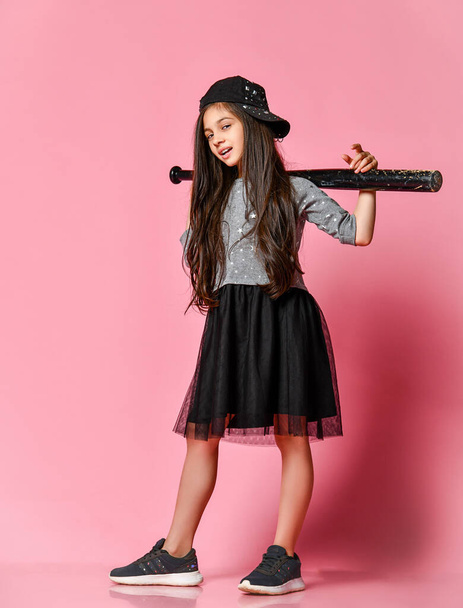 Young bright american girl with baseball bat - Фото, зображення