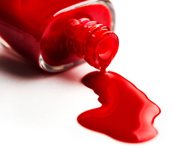 Pouring nail polish from bottle - Photo, Image