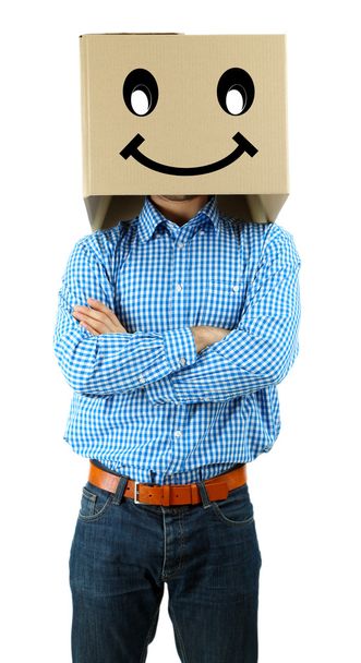 Man with cardboard box on his head isolated on white - Φωτογραφία, εικόνα