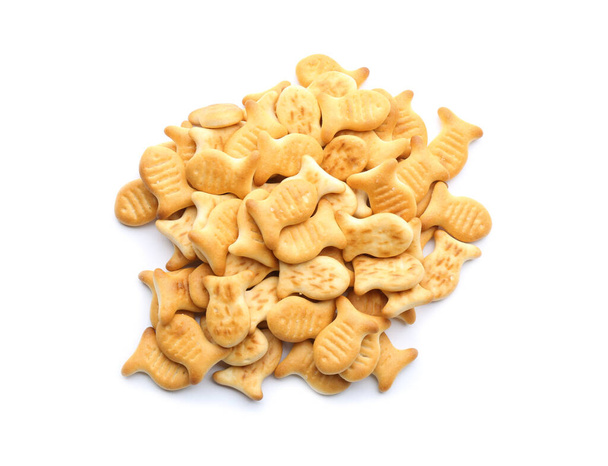 Delicious crispy goldfish crackers on white background, top view - Photo, Image