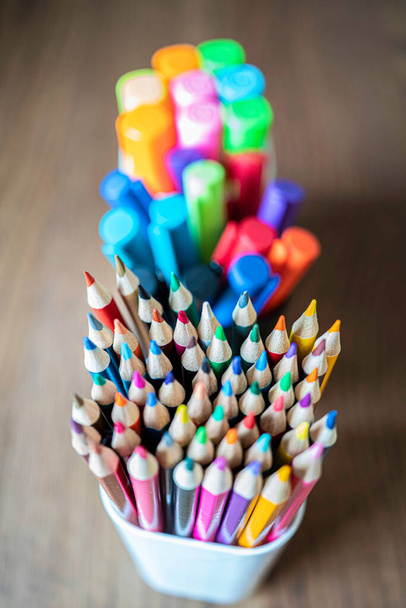 Collection of colored Pencils, pens and highligters in pen holders - Φωτογραφία, εικόνα