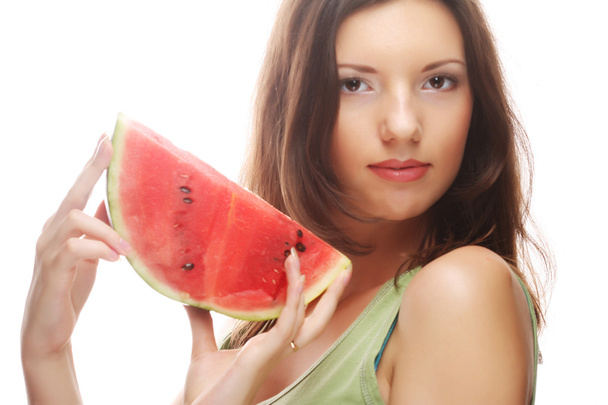 Woman holding watermelon ready to take a bite - Foto, Bild