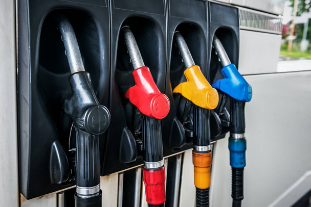 Gun gas petrol station of different colors. Transportation theme - Fotoğraf, Görsel