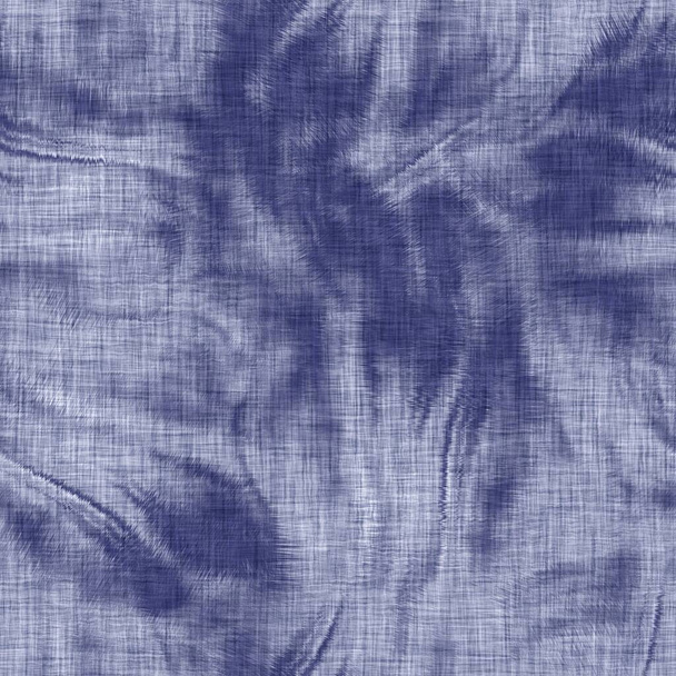 Textura moteada índigo sin costuras. Fondo de efecto teñido de algodón boro tejido azul. Batik japonés repetir resistir patrón. Blanqueador de tinte de corbata angustiado. fusión asiática allover kimono textil. Estampado de tela gastada - Foto, Imagen