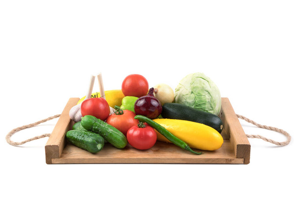 Асортимент різних свіжих овочів на білому тлі
. - Фото, зображення