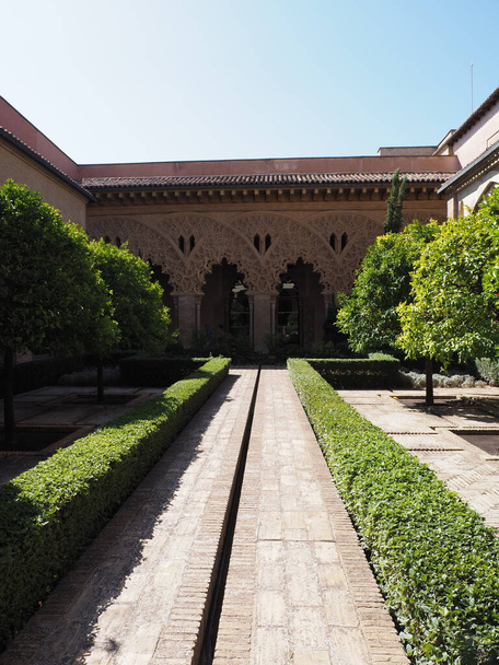 Courtyard of Aljaferia palace in european Saragossa city at Aragon district in Spain, clear blue sky in 2019 warm sunny summer day on September - vertical. - 写真・画像