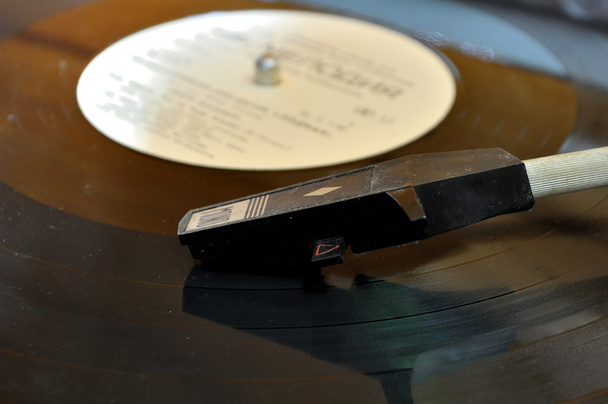 Schließen Sie die Ansicht von Vinyl und Player Head Grunge Foto - Foto, Bild