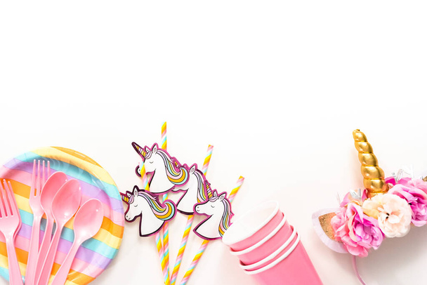 Flat lay. Objects for unicorn themed kids birthday party. - Photo, Image
