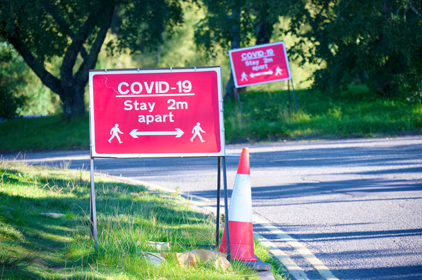 Building site open with covid-19 safety sign at entrance - Photo, Image
