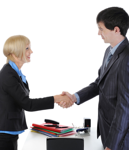Handshake happy business partners in the office. - Zdjęcie, obraz