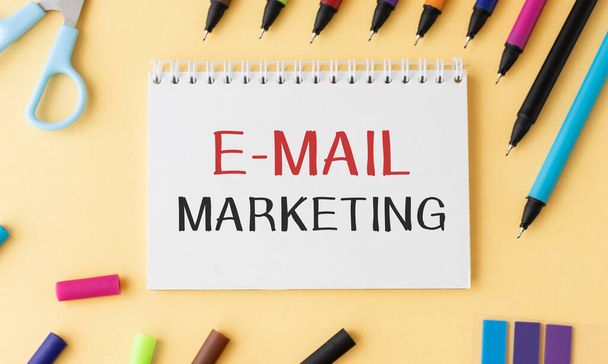 E-mail Marketing concept on notebook with envelopes and laptop - Valokuva, kuva
