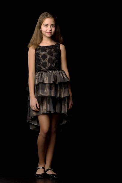 Beautiful young teen girl studio photo on black background - Zdjęcie, obraz